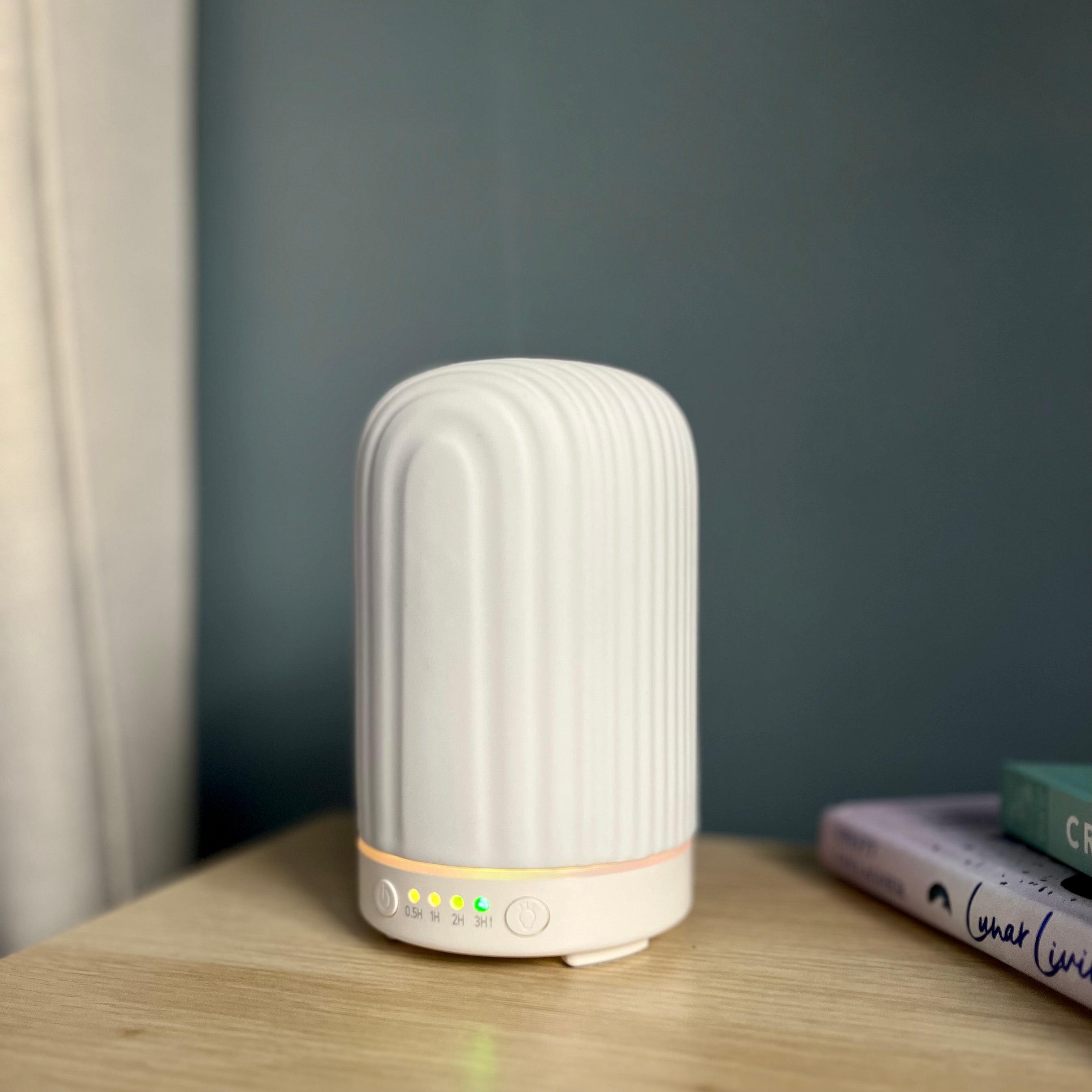 Ceramic white ribbed cylindrical electric diffuser 
